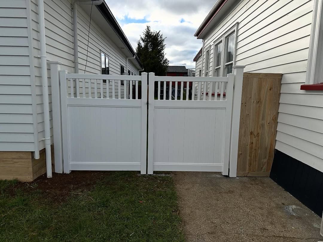 PVC gateway with timber finish
